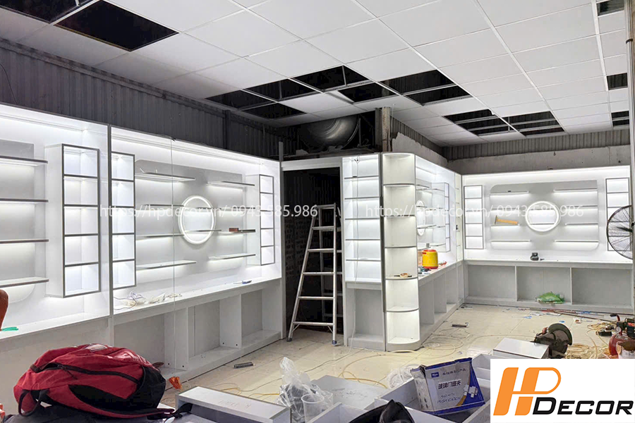 Thiết kế và thi công tủ kệ cửa hàng kính mắt sang trọng Noi That Cua Hang Kinh Mat 3
